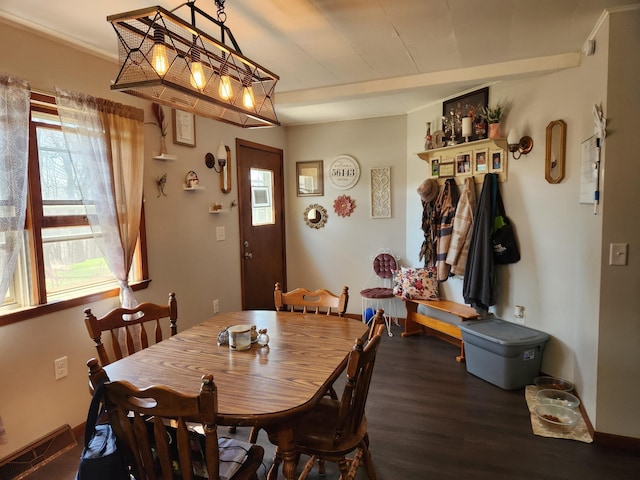 dining area featuring wood finished floors