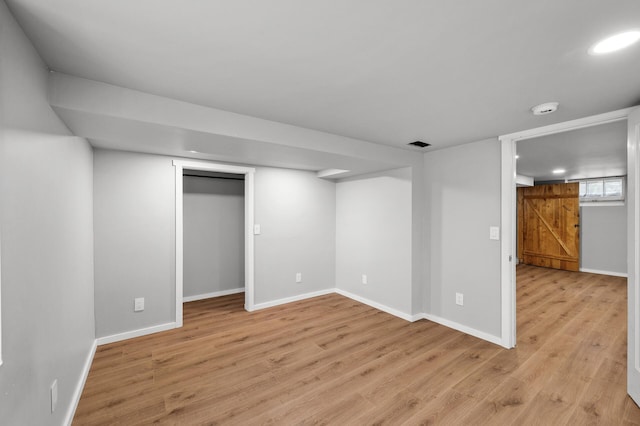 3806 Jackson St NE, Columbia Heights, MN 55421 - finished below grade area featuring light wood-style floors and baseboards