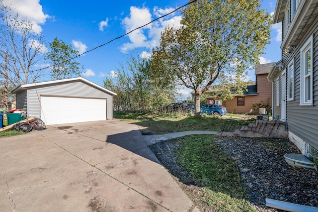 3806 Jackson St NE, Columbia Heights, MN 55421 - view of yard with an outdoor structure and a detached garage