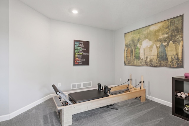 exercise area with baseboards, carpet flooring, and recessed lighting