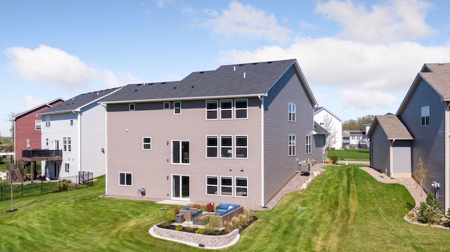 rear view of property with a yard, central AC unit, and an outdoor living space