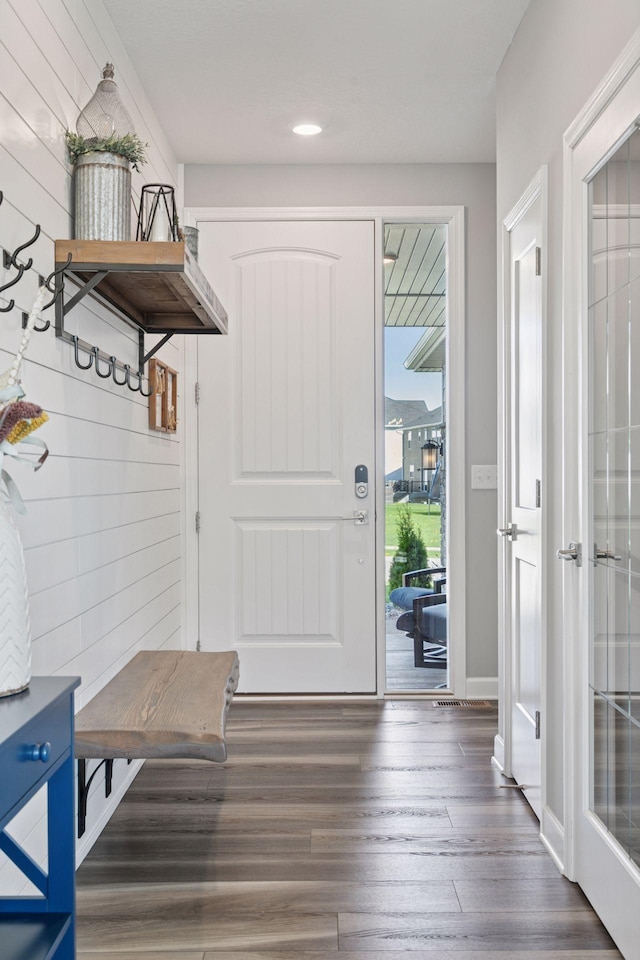 mudroom featuring wood finished floors and recessed lighting