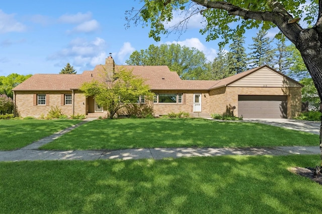 319 Meadow Ln, Benson, MN 56215 - ranch-style home featuring a chimney, a front yard, a garage, brick siding, and concrete driveway