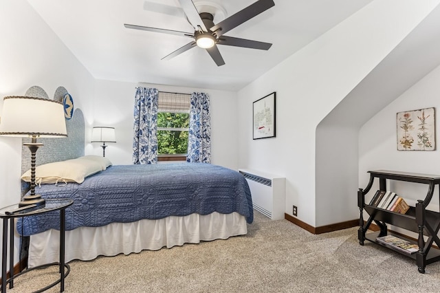 319 Meadow Ln, Benson, MN 56215 - carpeted bedroom featuring radiator, baseboards, and a ceiling fan