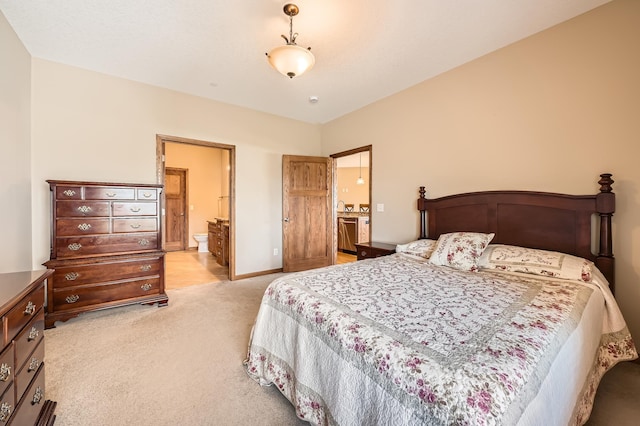 20620 Everton Way N, Forest Lake, MN 55025 - carpeted bedroom featuring baseboards and connected bathroom