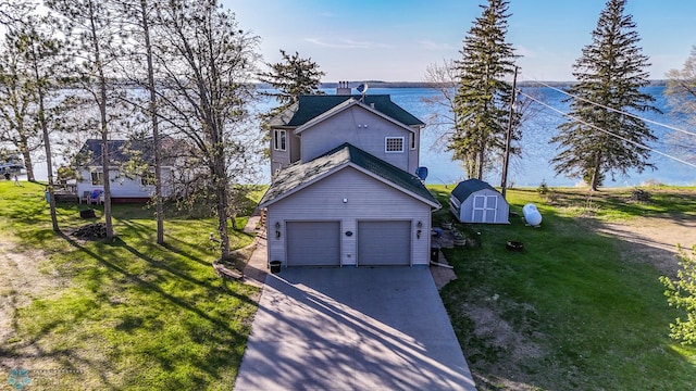 29972 293rd St, Little Elbow Twp, MN 56589 - traditional home with a storage shed, a front lawn, a garage, and an outdoor structure