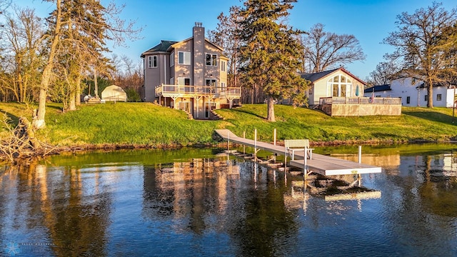 29972 293rd St, Little Elbow Twp, MN 56589 - dock featuring a yard and a deck with water view