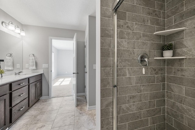 full bath featuring vanity and a stall shower