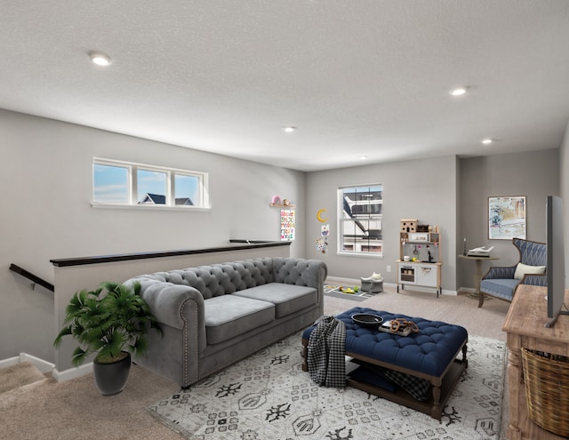 living room with baseboards, carpet flooring, and recessed lighting