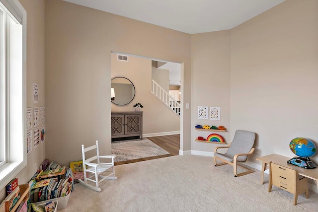 playroom featuring visible vents, baseboards, and carpet floors