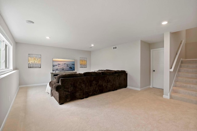 living area featuring light carpet, stairs, recessed lighting, baseboards, and visible vents