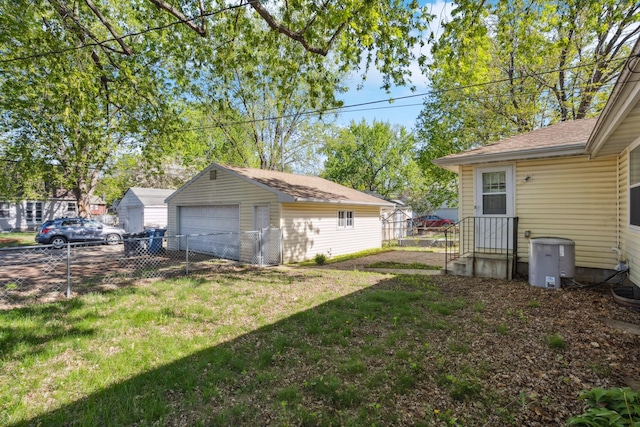 6021 10th Ave S, Minneapolis, MN 55417 - view of yard with a garage and an outbuilding