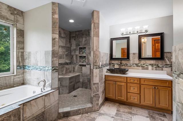 28008 Lake Diann Rd, Baldwin Twp, MN 55398 - full bath featuring tile walls, a bath, vanity, walk in shower, and a wainscoted wall