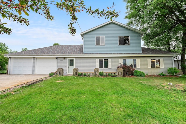 28008 Lake Diann Rd, Baldwin Twp, MN 55398 - back of house featuring driveway, a garage, a yard, and a shingled roof