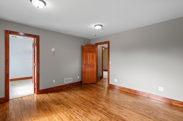 28008 Lake Diann Rd, Baldwin Twp, MN 55398 - empty room with light wood-style floors and baseboards