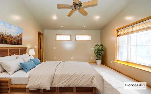 bedroom with ceiling fan, vaulted ceiling, carpet floors, and recessed lighting