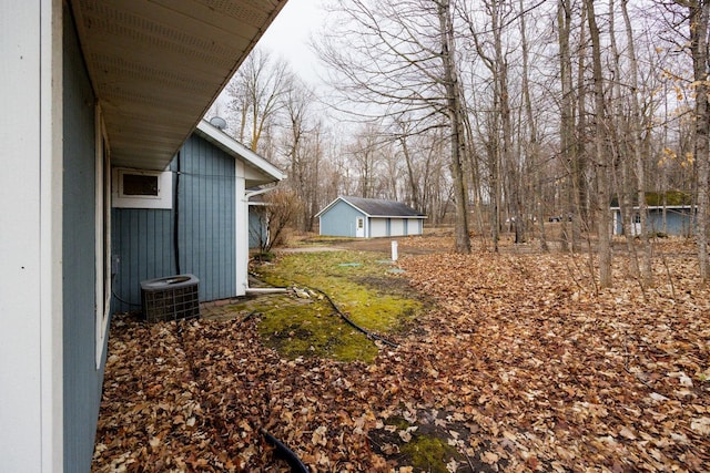 view of yard featuring central AC unit