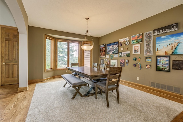 17 Lake Ct, North Oaks, MN 55127 - dining space featuring light wood-style floors and baseboards