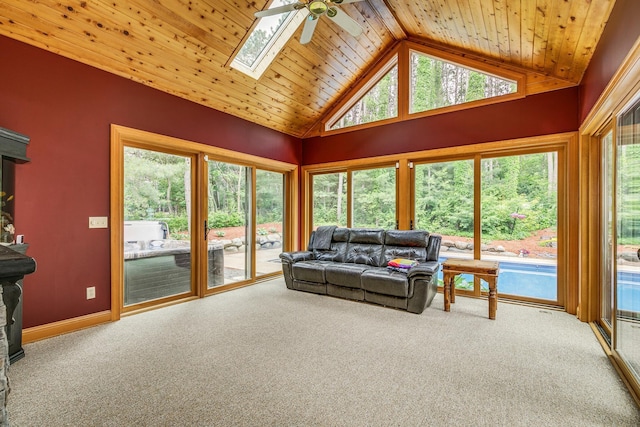 17 Lake Ct, North Oaks, MN 55127 - living area featuring a ceiling fan, carpet, wood ceiling, a skylight, and high vaulted ceiling