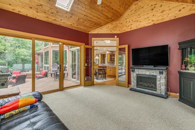 17 Lake Ct, North Oaks, MN 55127 - unfurnished living room with carpet, a skylight, wooden ceiling, a fireplace, and high vaulted ceiling