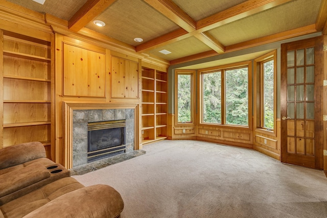 17 Lake Ct, North Oaks, MN 55127 - living area featuring coffered ceiling, healthy amount of natural light, a high end fireplace, beamed ceiling, and carpet flooring