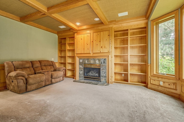 17 Lake Ct, North Oaks, MN 55127 - unfurnished living room with coffered ceiling, built in shelves, a high end fireplace, beam ceiling, and carpet flooring