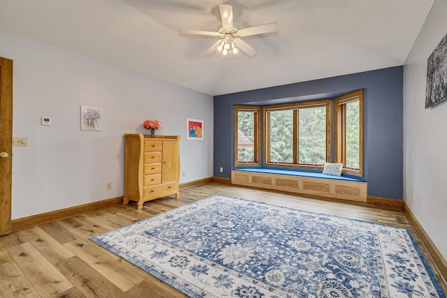 17 Lake Ct, North Oaks, MN 55127 - bedroom with light wood-style flooring, lofted ceiling, and ceiling fan