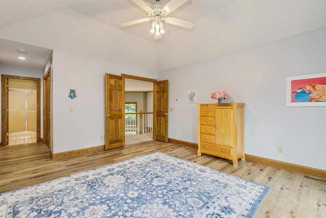 17 Lake Ct, North Oaks, MN 55127 - bedroom with wood finished floors and a ceiling fan