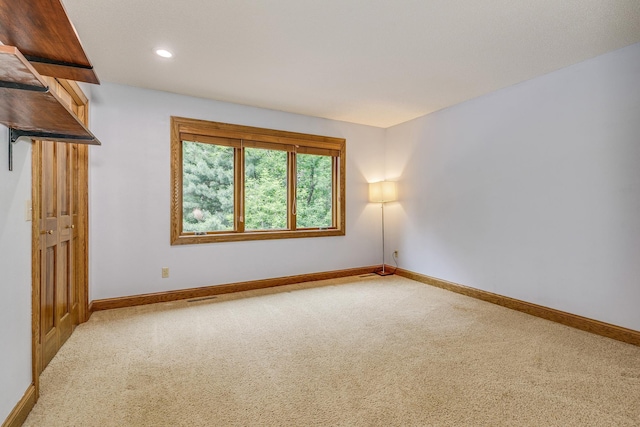 17 Lake Ct, North Oaks, MN 55127 - carpeted spare room with baseboards and recessed lighting