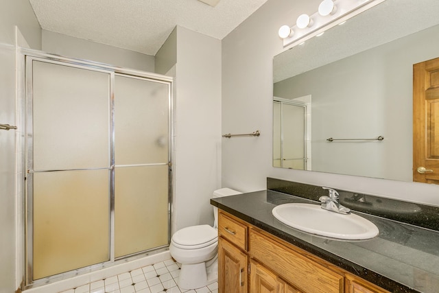 17 Lake Ct, North Oaks, MN 55127 - bathroom featuring vanity, a stall shower, and a textured ceiling