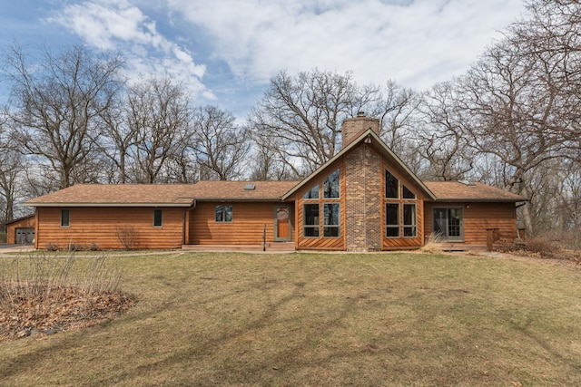 34126 County 115, Canton Twp, MN 55939 - back of house with a chimney and a yard