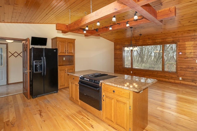 34126 County 115, Canton Twp, MN 55939 - kitchen with black fridge, electric range oven, wooden ceiling, light wood-style flooring, and beamed ceiling