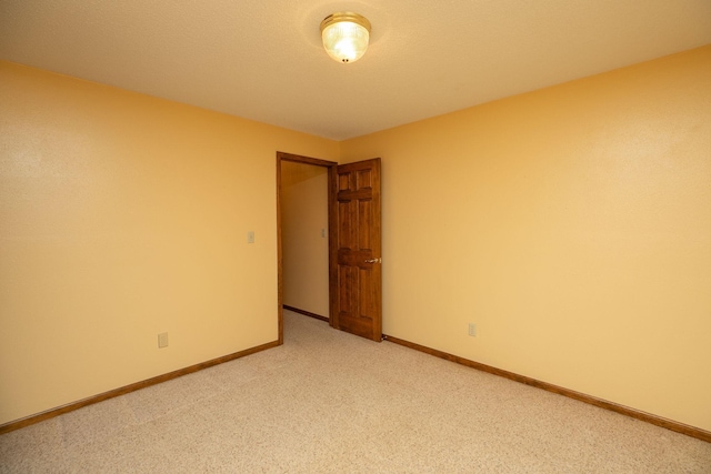 34126 County 115, Canton Twp, MN 55939 - unfurnished room with light carpet and baseboards