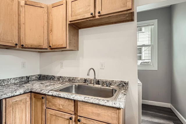 1907 University Ave NE, Minneapolis, MN 55418 - kitchen with baseboards, dark wood finished floors, and a sink