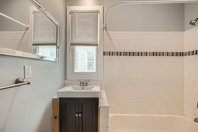 1907 University Ave NE, Minneapolis, MN 55418 - full bathroom featuring tub / shower combination and vanity