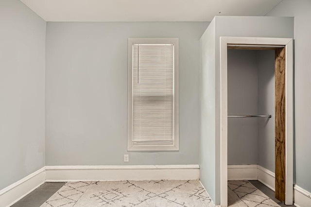 1907 University Ave NE, Minneapolis, MN 55418 - unfurnished bedroom featuring baseboards