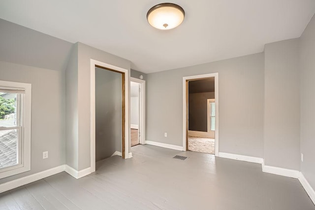 1907 University Ave NE, Minneapolis, MN 55418 - unfurnished bedroom with baseboards