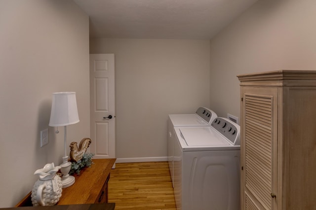 2730 State 371 SW, Pine River, MN 56474 - laundry area with washing machine and dryer, light wood-style flooring, baseboards, and laundry area