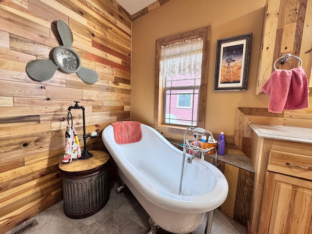 23660 Cap Endres Rd NE, Cass Lake, MN 56633 - full bath with wood walls and a freestanding bath