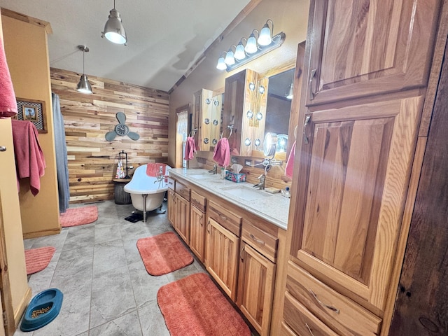 23660 Cap Endres Rd NE, Cass Lake, MN 56633 - full bath with lofted ceiling, wood walls, a soaking tub, and double vanity