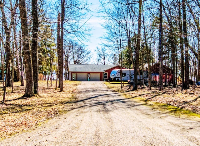 23660 Cap Endres Rd NE, Cass Lake, MN 56633 - ranch-style home with driveway and an attached garage