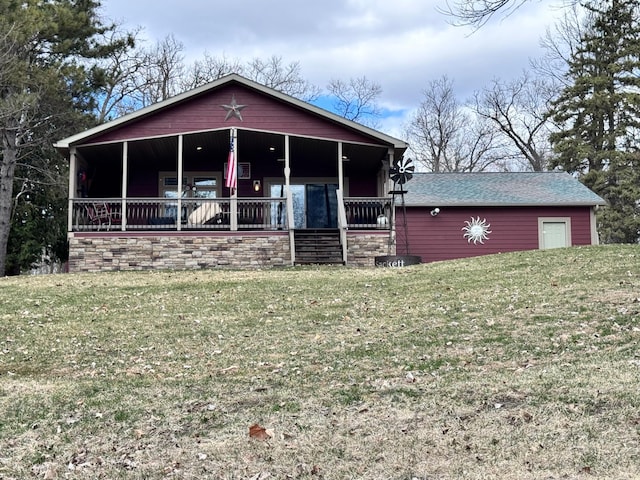 23660 Cap Endres Rd NE, Cass Lake, MN 56633 - view of front of house with a front lawn and roof with shingles