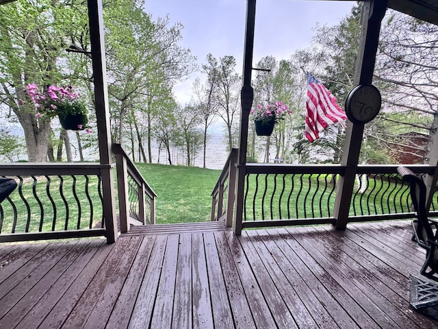 23660 Cap Endres Rd NE, Cass Lake, MN 56633 - wooden terrace featuring a water view and a yard