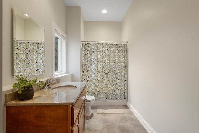 6570 Chester Ave, Webster Twp, MN 55057 - bathroom featuring vanity, toilet, baseboards, shower / bathtub combination with curtain, and recessed lighting