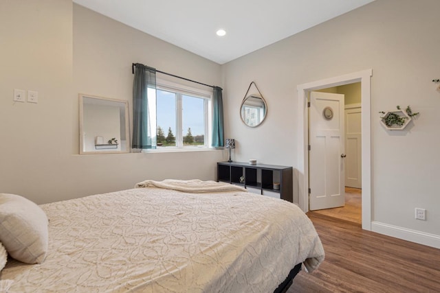 6570 Chester Ave, Webster Twp, MN 55057 - bedroom featuring baseboards, recessed lighting, and wood finished floors