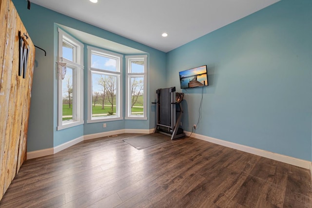 6570 Chester Ave, Webster Twp, MN 55057 - spare room with baseboards, recessed lighting, and wood finished floors