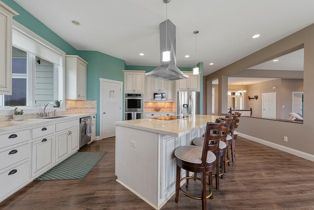 6570 Chester Ave, Webster Twp, MN 55057 - kitchen with a sink, appliances with stainless steel finishes, decorative backsplash, and island range hood