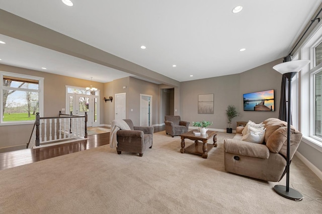 6570 Chester Ave, Webster Twp, MN 55057 - living area with baseboards, carpet flooring, a notable chandelier, and recessed lighting