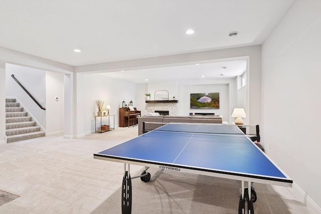 playroom featuring baseboards, a fireplace, recessed lighting, and carpet
