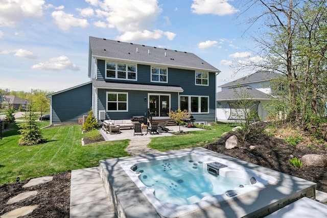 rear view of house with a yard, a patio, an outdoor hangout area, an outdoor hot tub, and entry steps